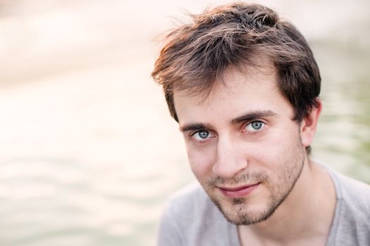 Portrait of a young man with blue eyes