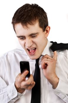 Angry businessman with cellular phone over white.  Intentional motion blur