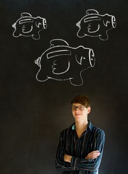 Businessman, student or teacher with chalk piggie banks  concept blackboard background