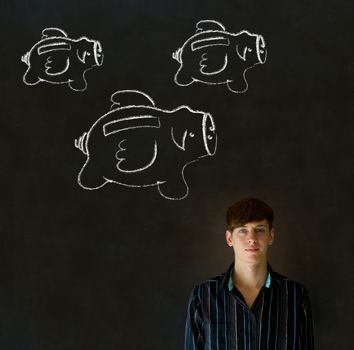 Businessman, student or teacher with chalk piggie banks concept blackboard background