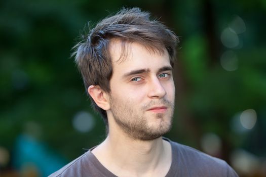 Portrait of a young man with blue eyes