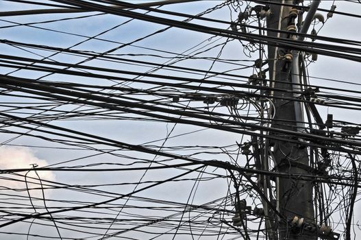 A Lot of Electric Cables over a Cloudy Sky in Vietnam