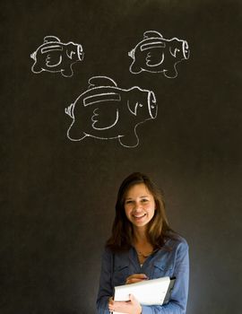 Businesswoman, student or teacher with chalk piggie banks  concept blackboard background