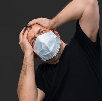 Portrait of sick old man in medical mask