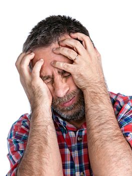 Headache. Portrait of an middle age man with face closed by hand. Isolated on white