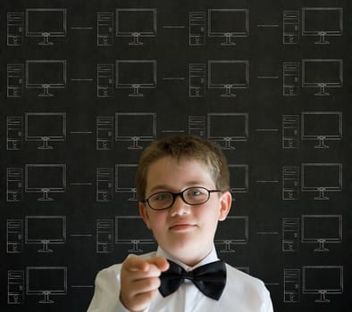 Finger pointing boy with chalk networks on blackboard background
