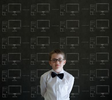 Standing boy with chalk networks on blackboard background