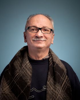 Smiling elderly man with glasses