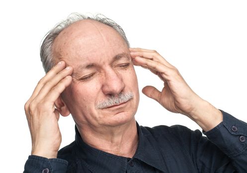 Elderly man suffering from a headache isolated on white