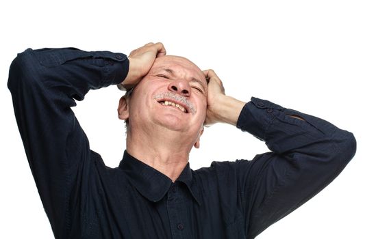 Elderly man suffering from a headache isolated on white