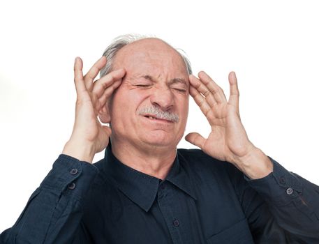 Elderly man suffering from a headache isolated on white