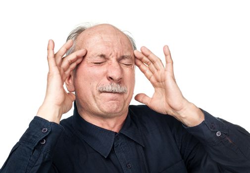 Old man suffering from a headache isolated on white