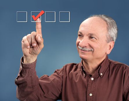 Old man choose check mark on box