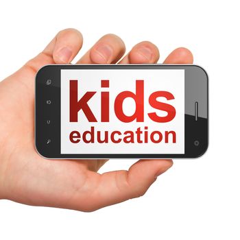 Education concept: hand holding smartphone with word Kids Education on display. Generic mobile smart phone in hand on White background.