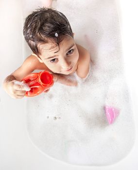 Boy washing in the bathroom