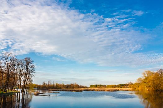 Sky And Clouds Reflection On River