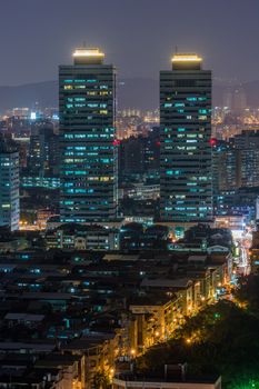 Colorful city night scene with modern skyscrapers, Taipei, Taiwan.
