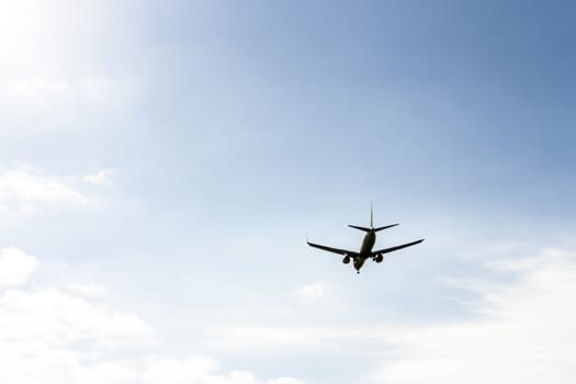 airplane flying at blue sky