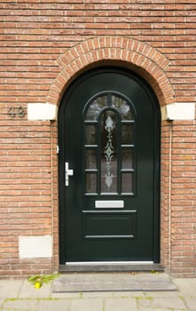 Green Lacquered Door in Dutch town, the Netherlands