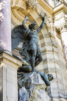 Fountain Saint-Michel at Place Saint-Michel in Paris, France. It was constructed in 1858-1860 during French Second Empire by architect Gabriel Davioud. Archangel Michael and devil by Francisque Duret.