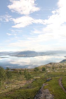 Scenic panorama of fjord on in northern Norway on sunny summer day