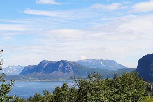 Scenic panorama of fjord on in northern Norway on sunny summer day