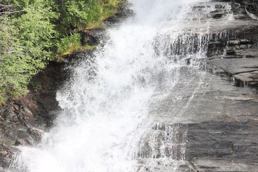 Close-up of waterfall in mountains of Norway in summer