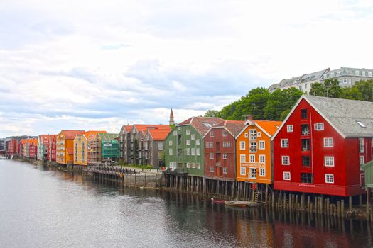 Cityscape of Trondheim, Norway with old houses on embankment