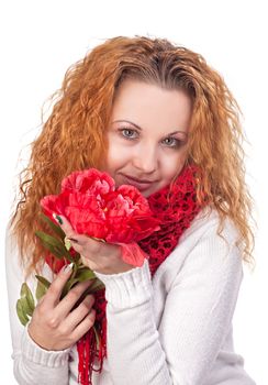Portrait of young beautiful woman with red flower