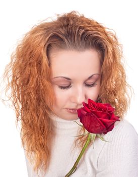 Portrait of young beautiful woman with red rose