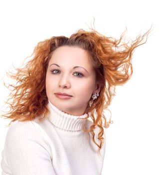 Young attractive girl with flying hair
