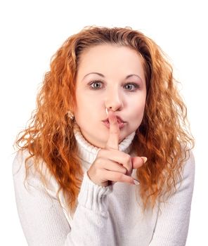 Beautiful young woman asking for silence