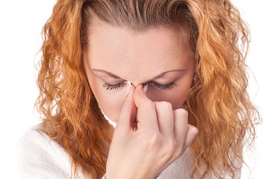 Young woman suffering from headache