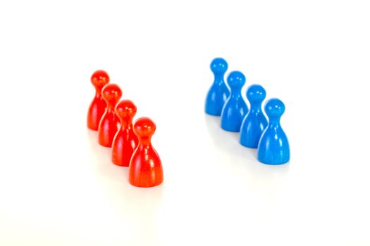 Eight colourful meeples standing in two lines
