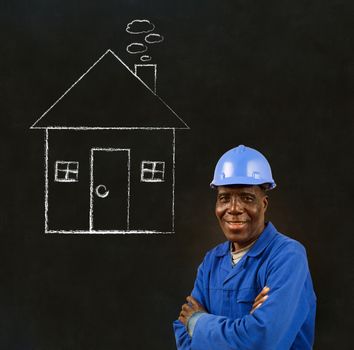 African American black man worker with chalk house on a blackboard background