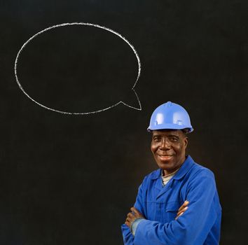 African American black man worker with chalk speech bubble on a blackboard background