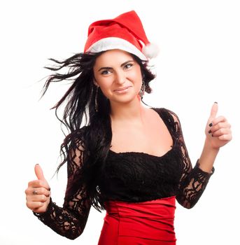 Portrait of joyful pretty woman in red santa claus hat