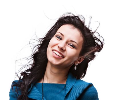 Portrait of a beautiful young woman with hair flying