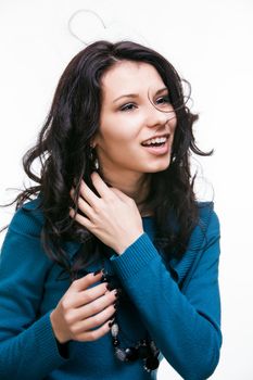 Portrait of a beautiful young woman with hair flying