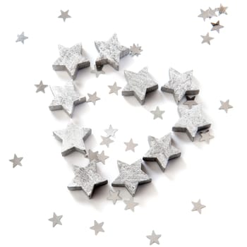 silver stars for christmas in the shape of a heart