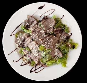 Salad of boiled meat, lettuce and sauce sprinkled with cheese
