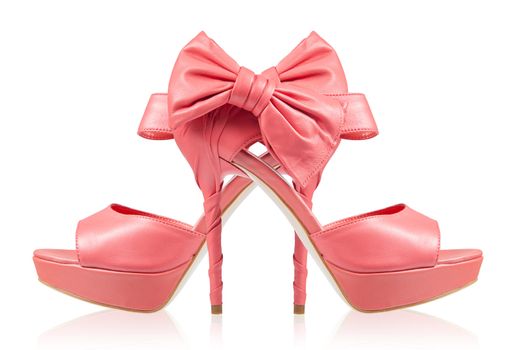 Evening pink shoes with a bow on a high heel. Isolated on a white background. collage
