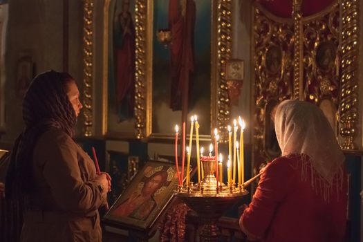 GOMEL - MAY 4: Women Pray At Easter In Front Of The Icon In Belarusian Orthodox Church On May 4, 2013 In Gomel, Belarus