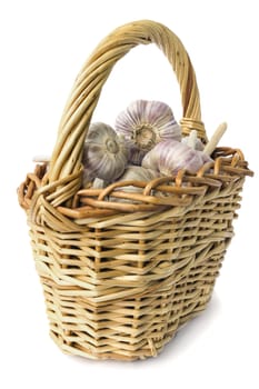Basket of garlic on a white background