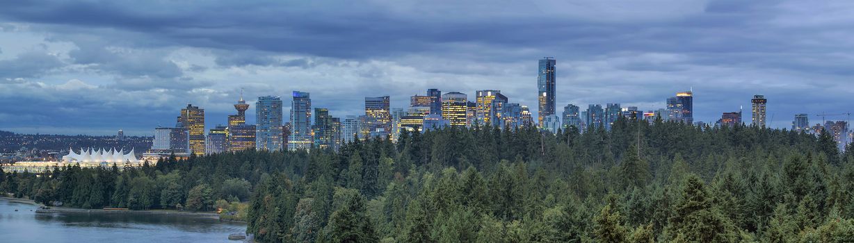 Vancouver BC Canada Downtown Skyline with Stanley Park at Evening Blue Hour Panorama