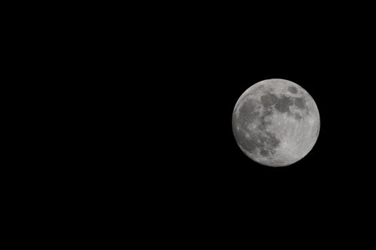 A Very Big Full White Moon on the Black of the Night