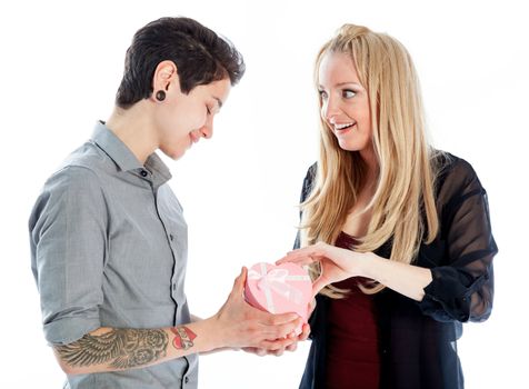 Cute Lesbian couple 30 years old shot in studio isolated on a white background