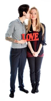 Cute Lesbian couple 30 years old shot in studio isolated on a white background