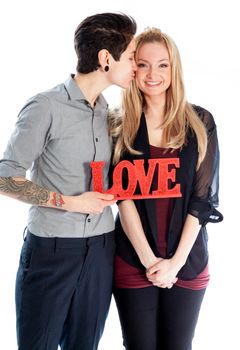 Cute Lesbian couple 30 years old shot in studio isolated on a white background