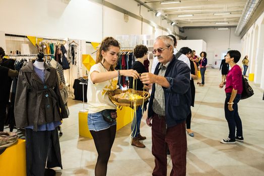 MILAN, ITALY - SEPTEMBER 20: So Critical So Fashion exhibition in Milan on September, 20 2013. Important alternative  fashion exhibition of biologiacal, vegan and recycled materials during Milan Fashion Week